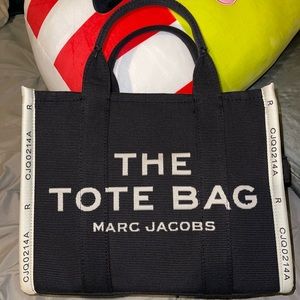 Marc Jacobs Tote Bag size small in the color black. Never used, brand new! (:
